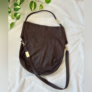 Foley + Corinna fold-over bag with shoulder handle and crossbody strap